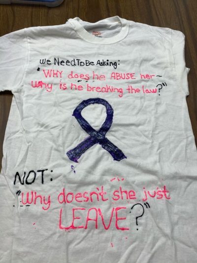 "We need to be asking 'why does he abuse her- why is he breaking the law?' Not 'why doesn't she just LEAVE?'" White represents people who have died due to violence.